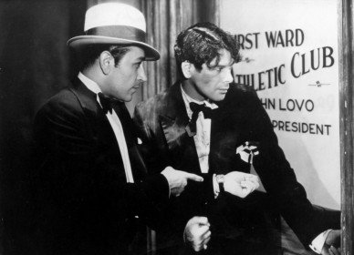 George Raft et Paul Muni dans Scarface